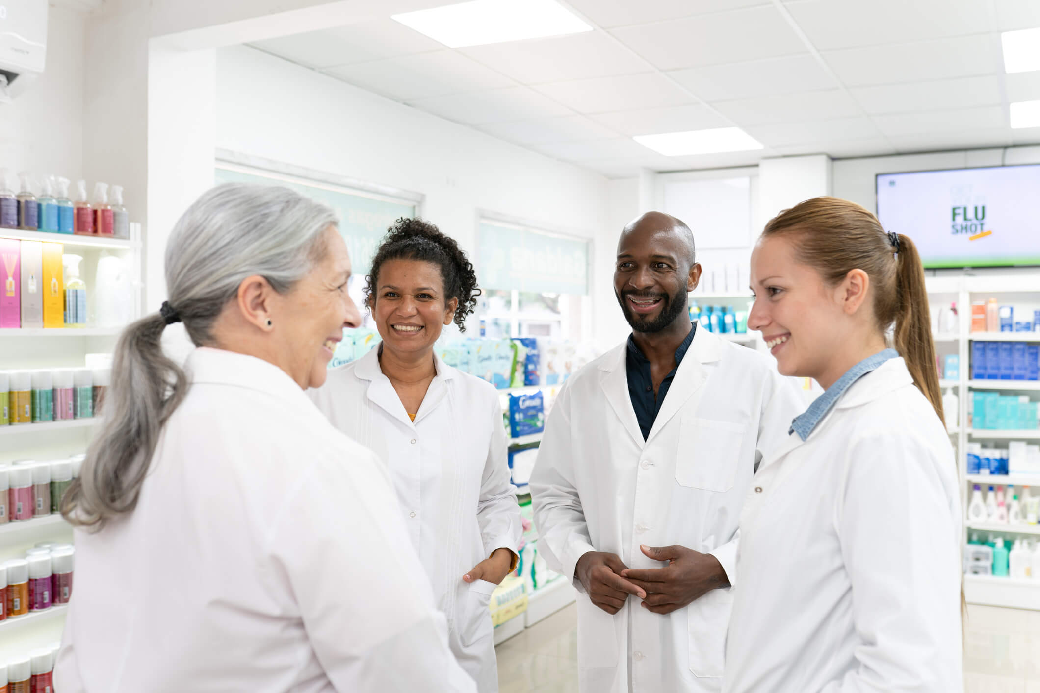 Pharmacists in a group conversation