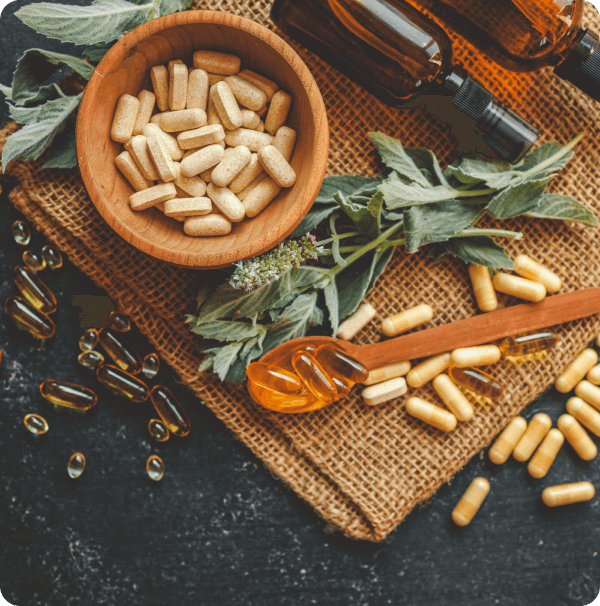 Capsules and herbs on burla Natural product selection from trusted natural organic products broker.p